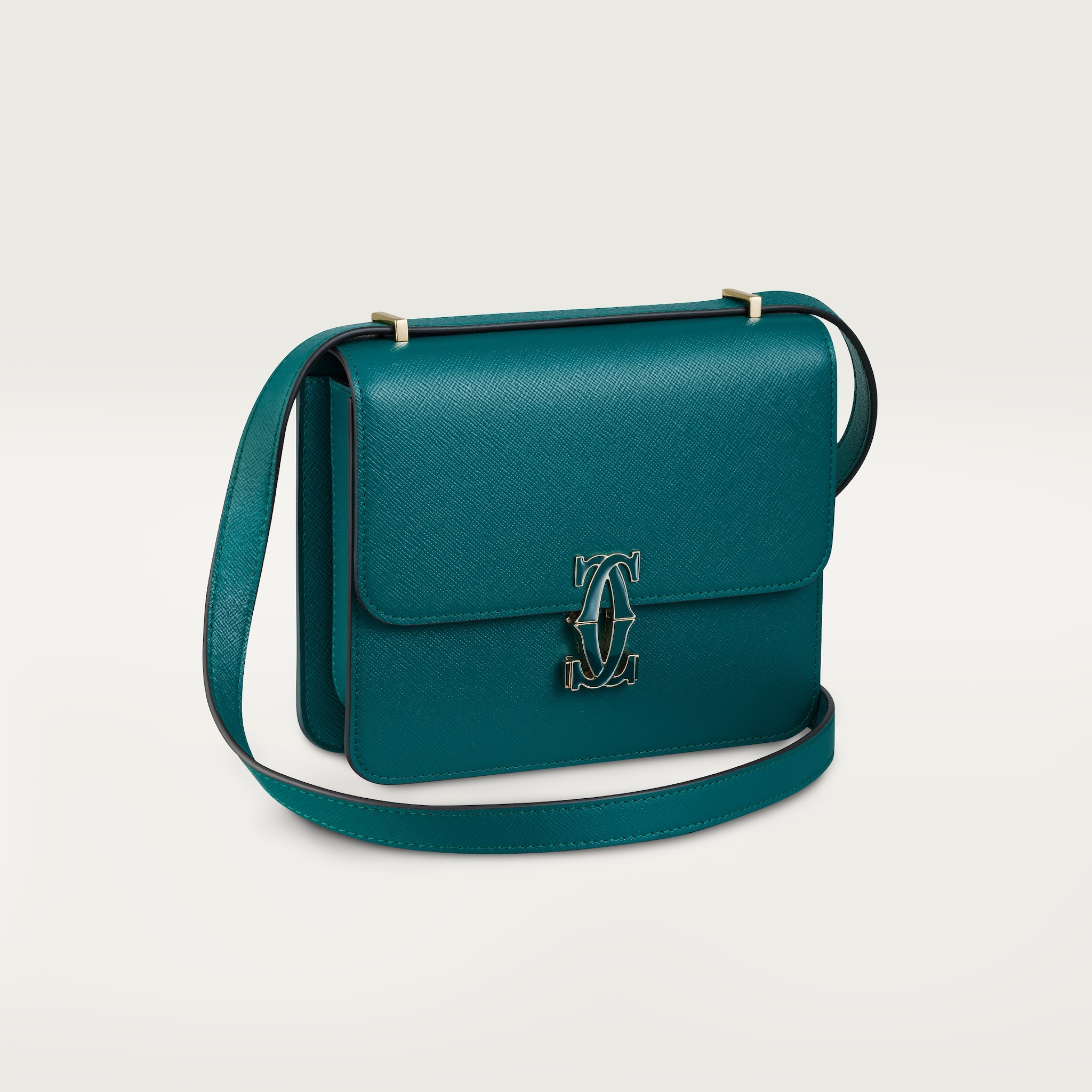 Mini model shoulder bag, C de CartierPetrol blue textured calfskin, golden finish and petrol blue enamel