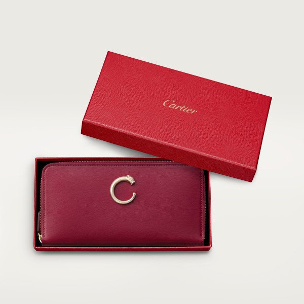 Zipped international wallet, Panthère de Cartier Cherry red calfskin, golden finish