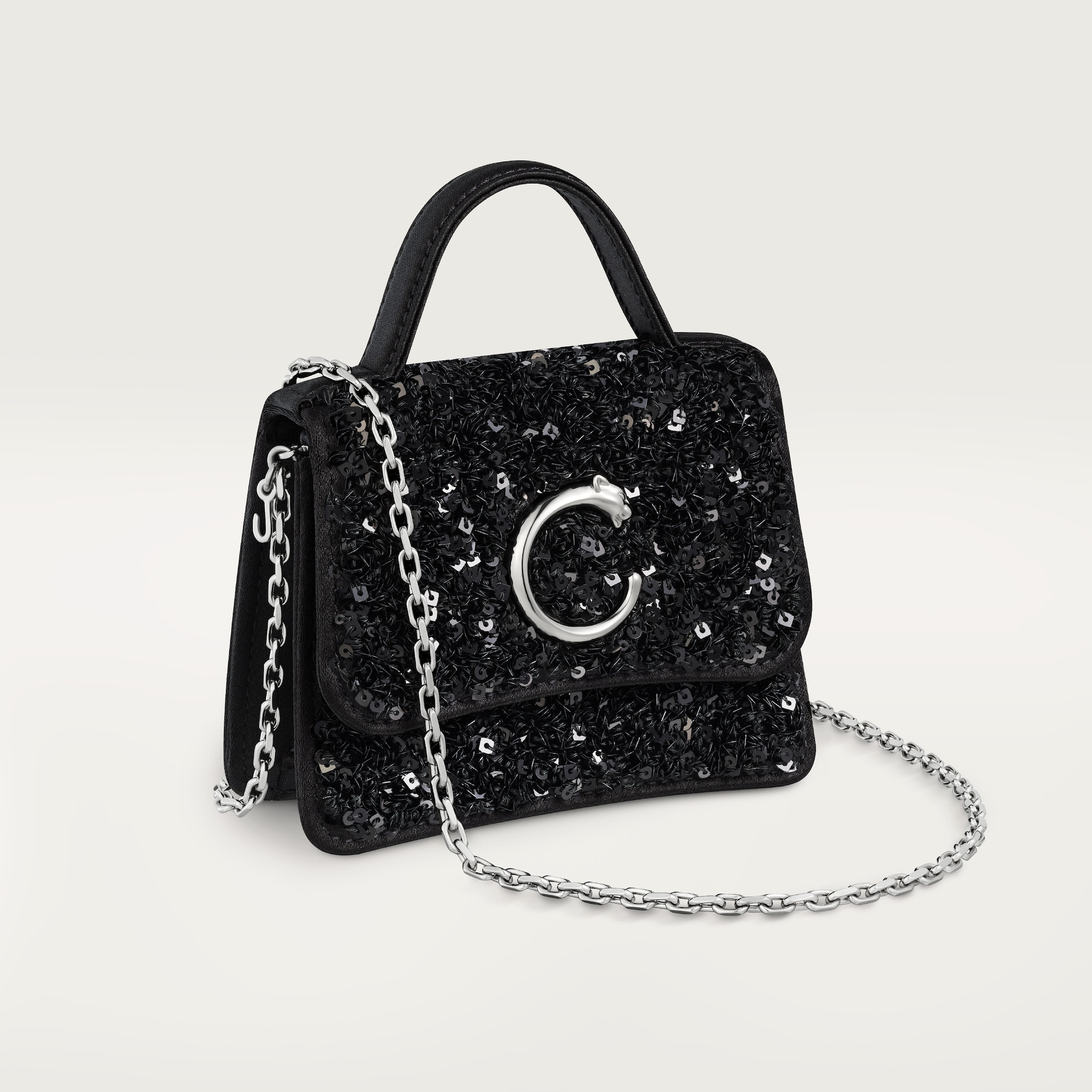 Bolso de cadena tamaño micro, Panthère de CartierLentejuelas negras sobre una base de nailon reciclado ECONYL®, acabado paladio